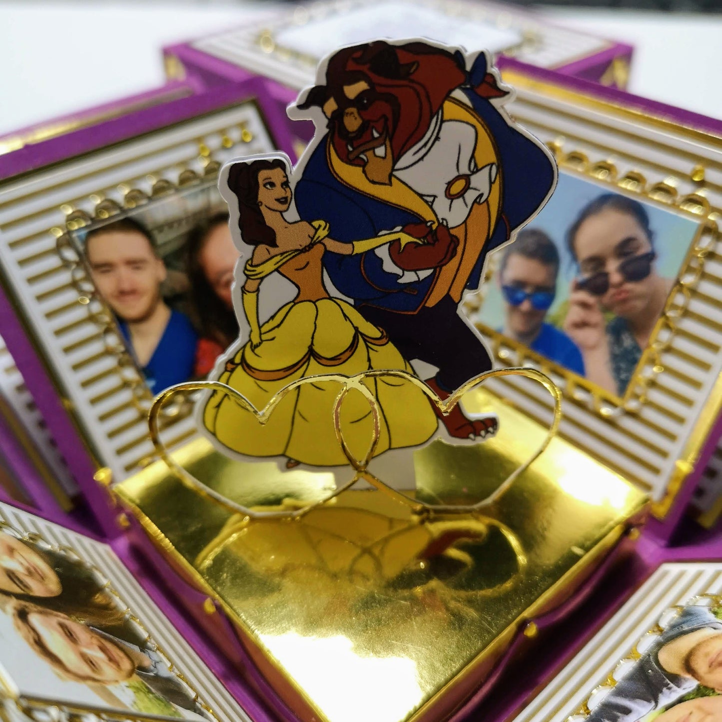Exploding Memory Photo Box - Purple & Gold Stripes, showcasing a handcrafted, customizable keepsake with intricate patterns, elegant photo spaces, and a dynamic pop-up centerpiece, ideal for preserving cherished memories.