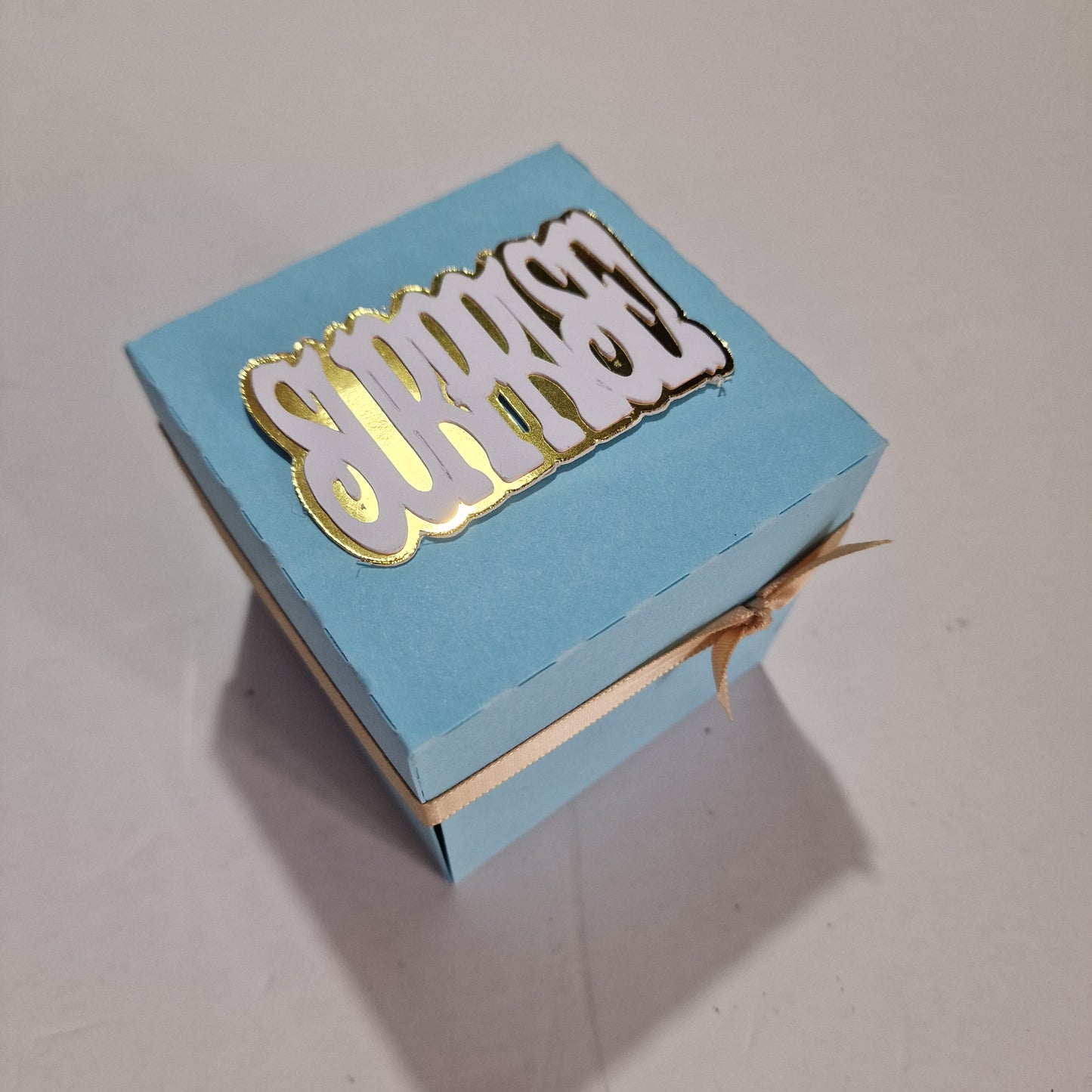 New York - Black & Gold - Surprise Special Occasion | Celebration Trip Reveal Explosion Box featuring a freestanding Statue of Liberty, New York Skyline, and themed decorative panels inside a blue box with gold accents.