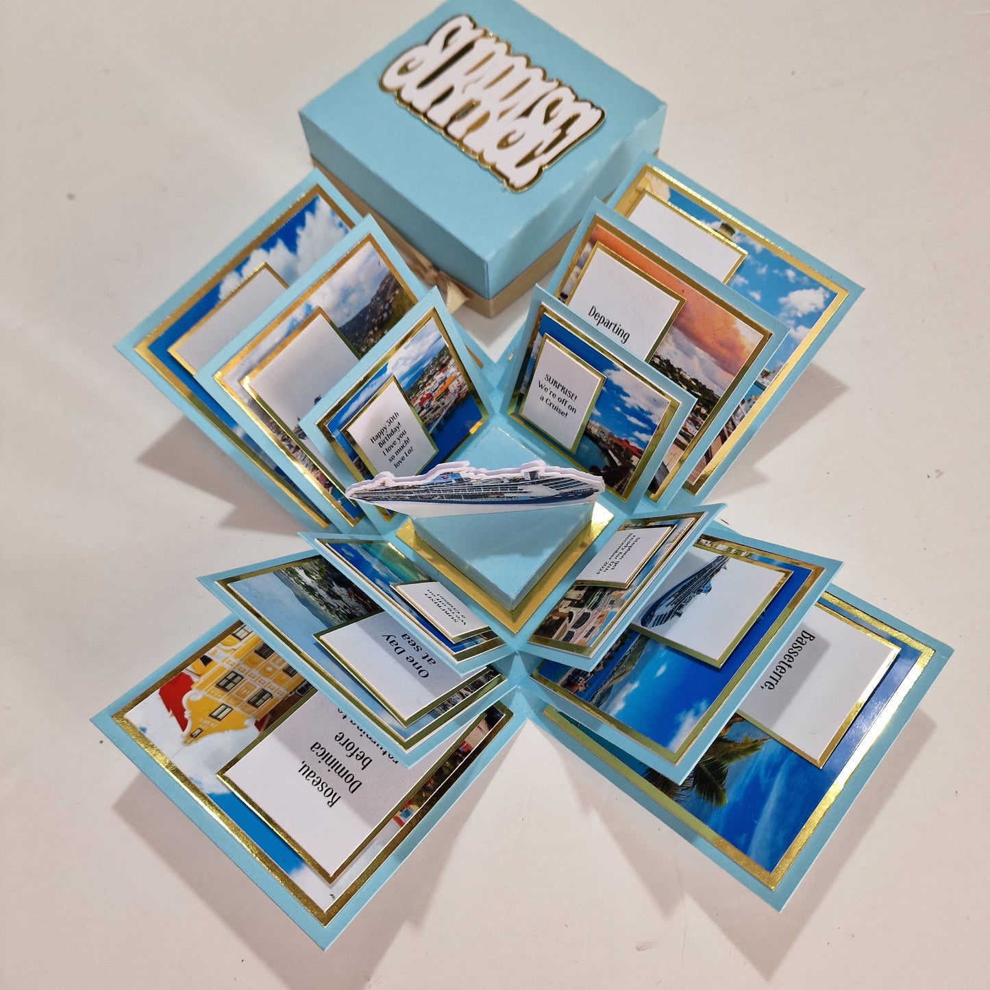 New York - Black & Gold - Surprise Special Occasion | Celebration Trip Reveal Explosion Box featuring New York-themed elements, including a freestanding Statue of Liberty, skyline, and intricate paper panels.