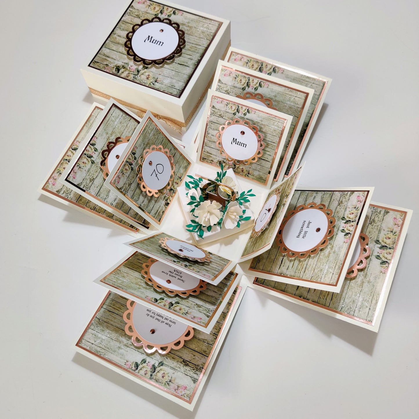 Custom Designed Birthday Celebration Pop-Open Box Card featuring a floral and rustic wood-themed exterior. Upon opening, reveals layered panels for personal messages and a central paper flower bouquet centerpiece.