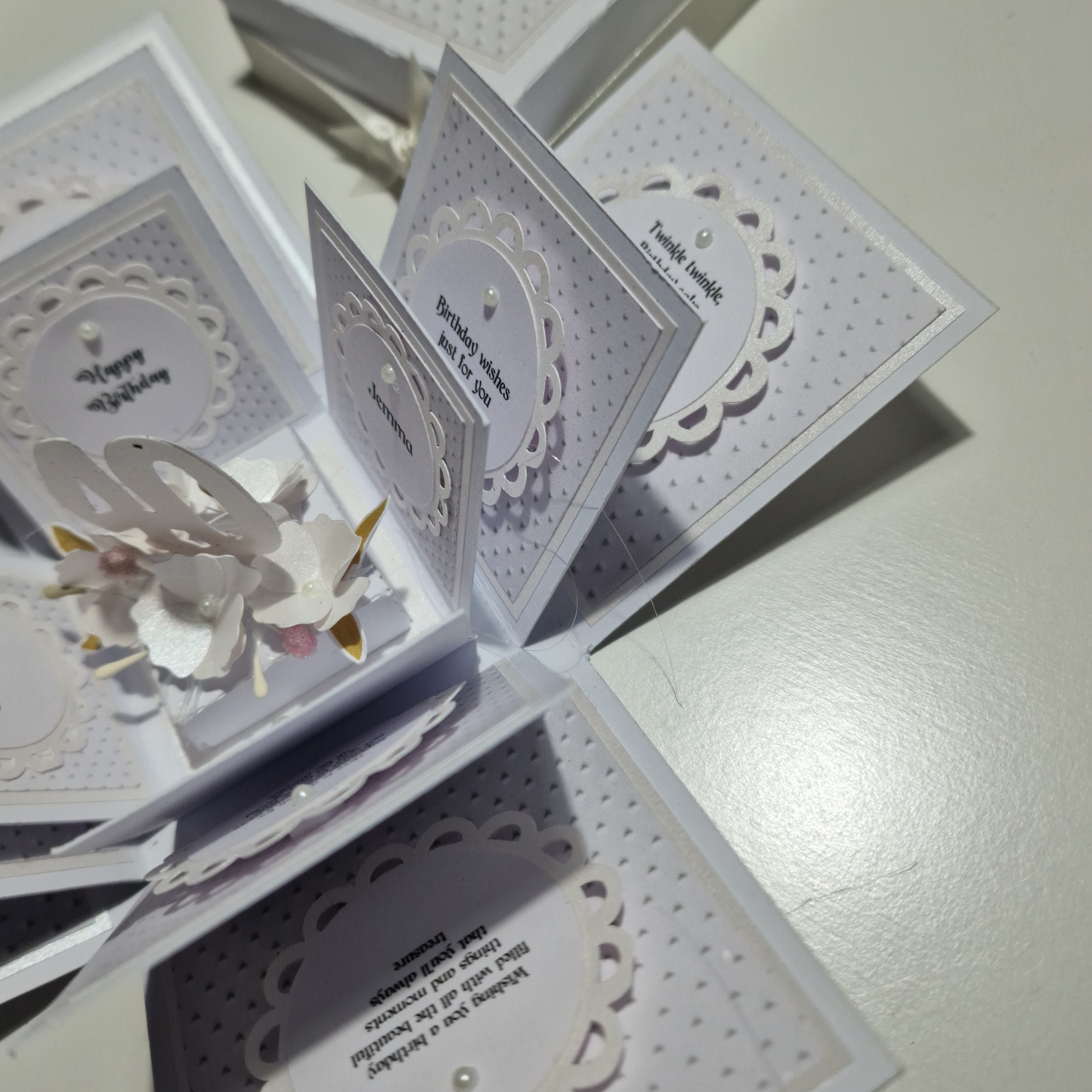 Embossed Elegance Birthday Celebration Pop-Open Box Card features intricate embossing on its surface, revealing a festive, celebratory design when opened, ideal for adding a unique touch to birthday greetings.