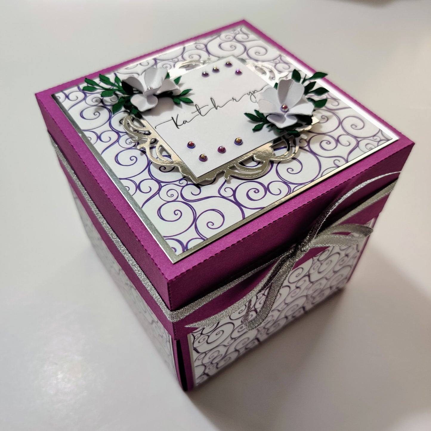 Exploding Memory Photo Box - Purple with Silver Swirls, customizable box designed to hold up to 80 photos, featuring various size and design options for personal keepsakes; personalized centerpiece available.