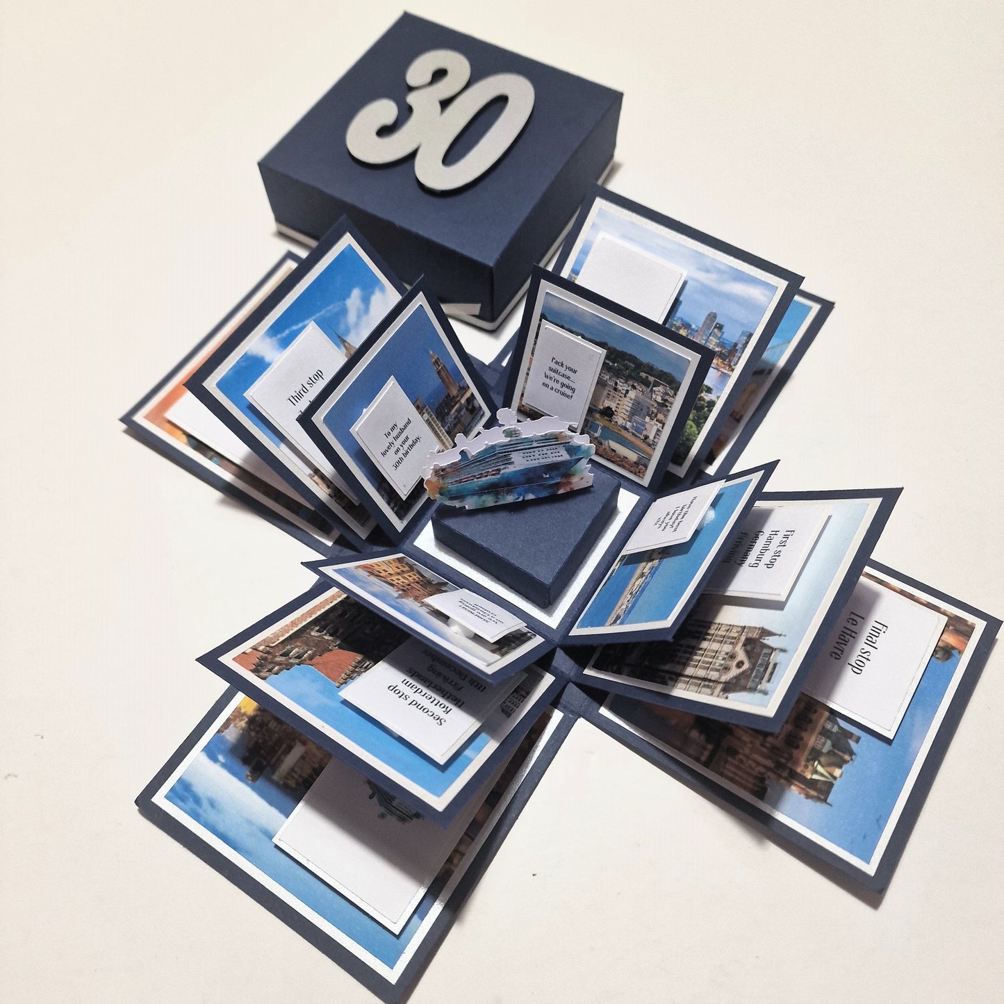 New York - Black & Gold - Surprise Special Occasion | Celebration Trip Reveal Explosion Box featuring a freestanding Statue of Liberty, New York Skyline, and personalized panels detailing the celebratory trip.