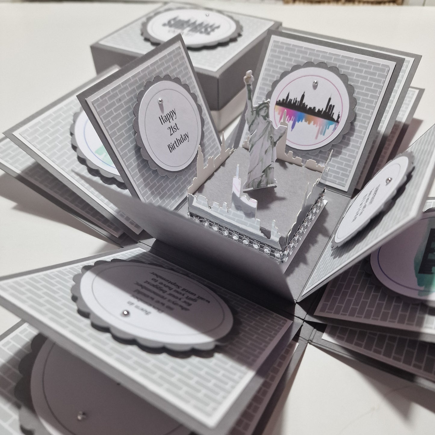 New York-themed explosion box, titled New York - Silver Grey Graffiti Styled - Surprise Special Occasion, featuring a freestanding Statue of Liberty, iconic skyline, and subway tile panels for a unique celebration reveal.