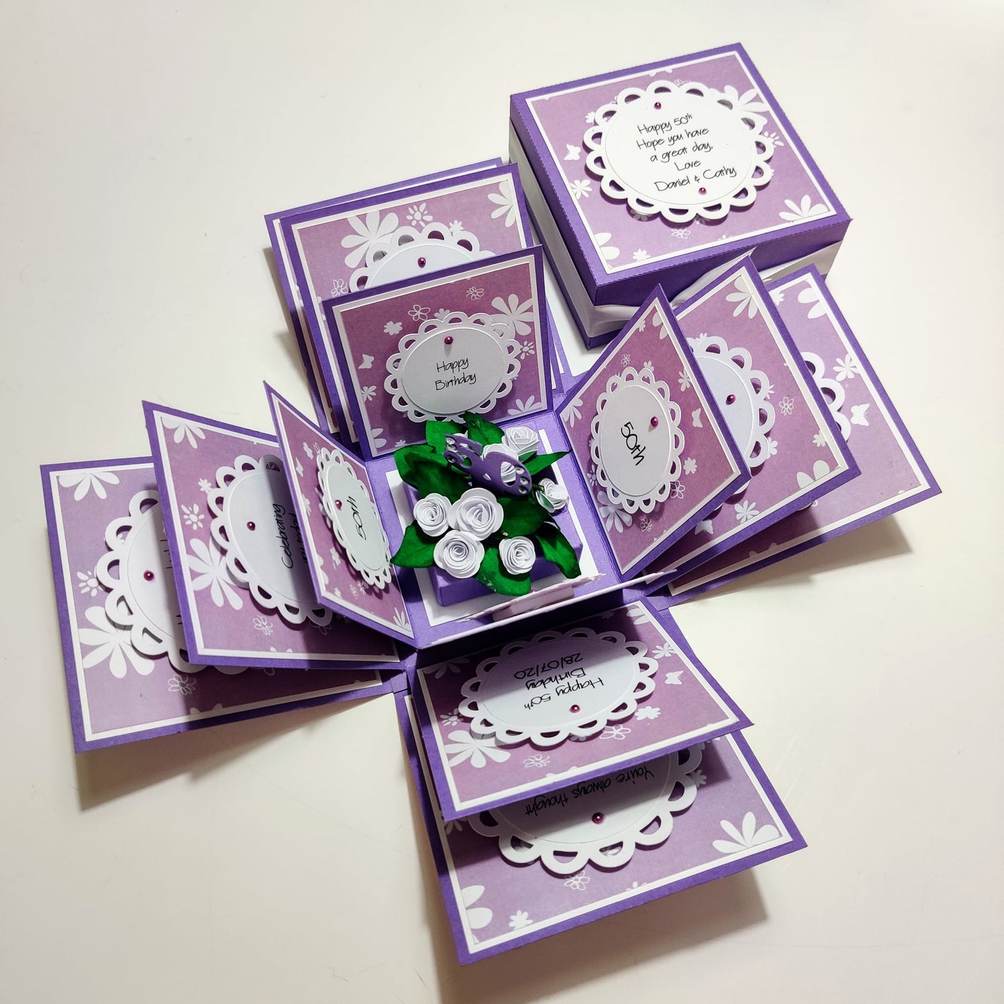 Lilac & White Roses Birthday Celebration Pop-Open Box Card featuring a beautifully crafted pop-up design with delicate rose embellishments, perfect for sending birthday wishes in an enchanting and unique way.