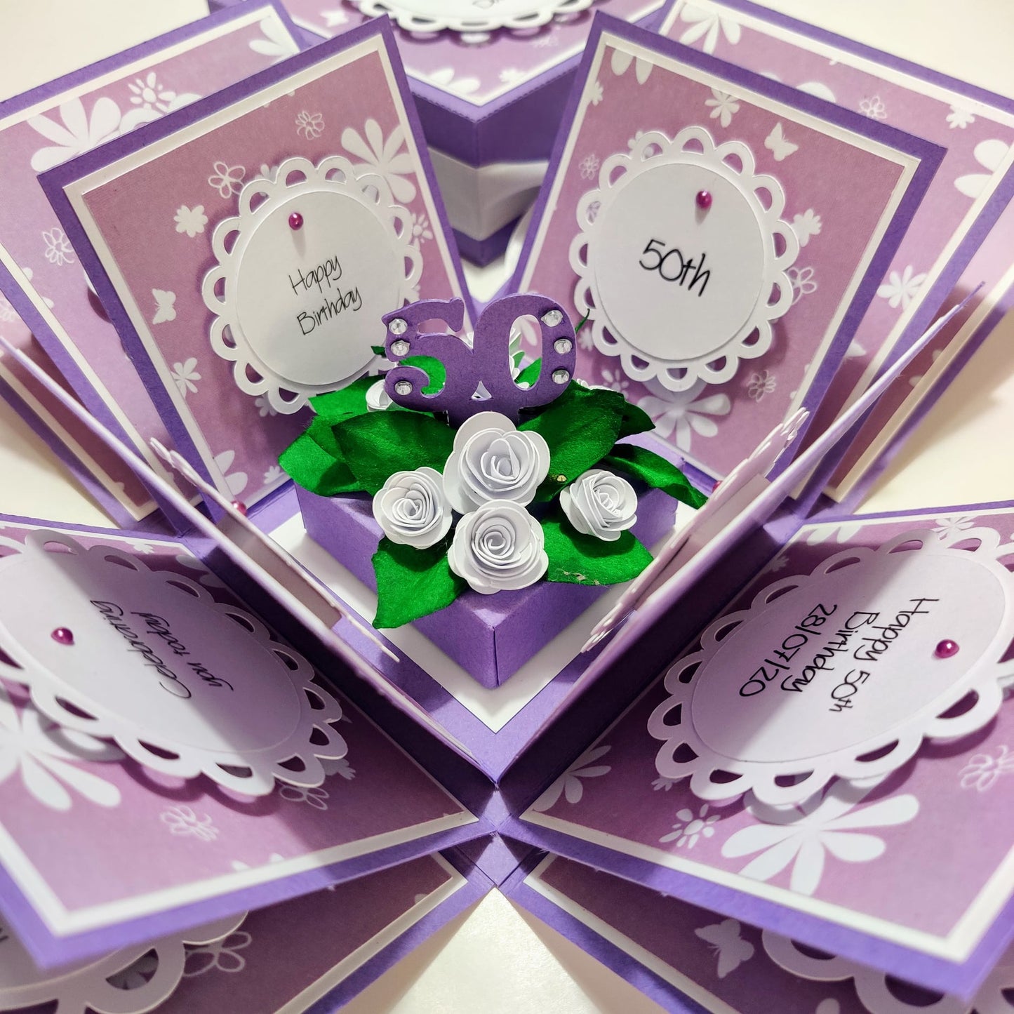 Lilac & White Roses Birthday Celebration Pop-Open Box Card featuring elegant floral designs, ideal for gifting. The card opens to reveal charming accents, perfect for a memorable birthday celebration.