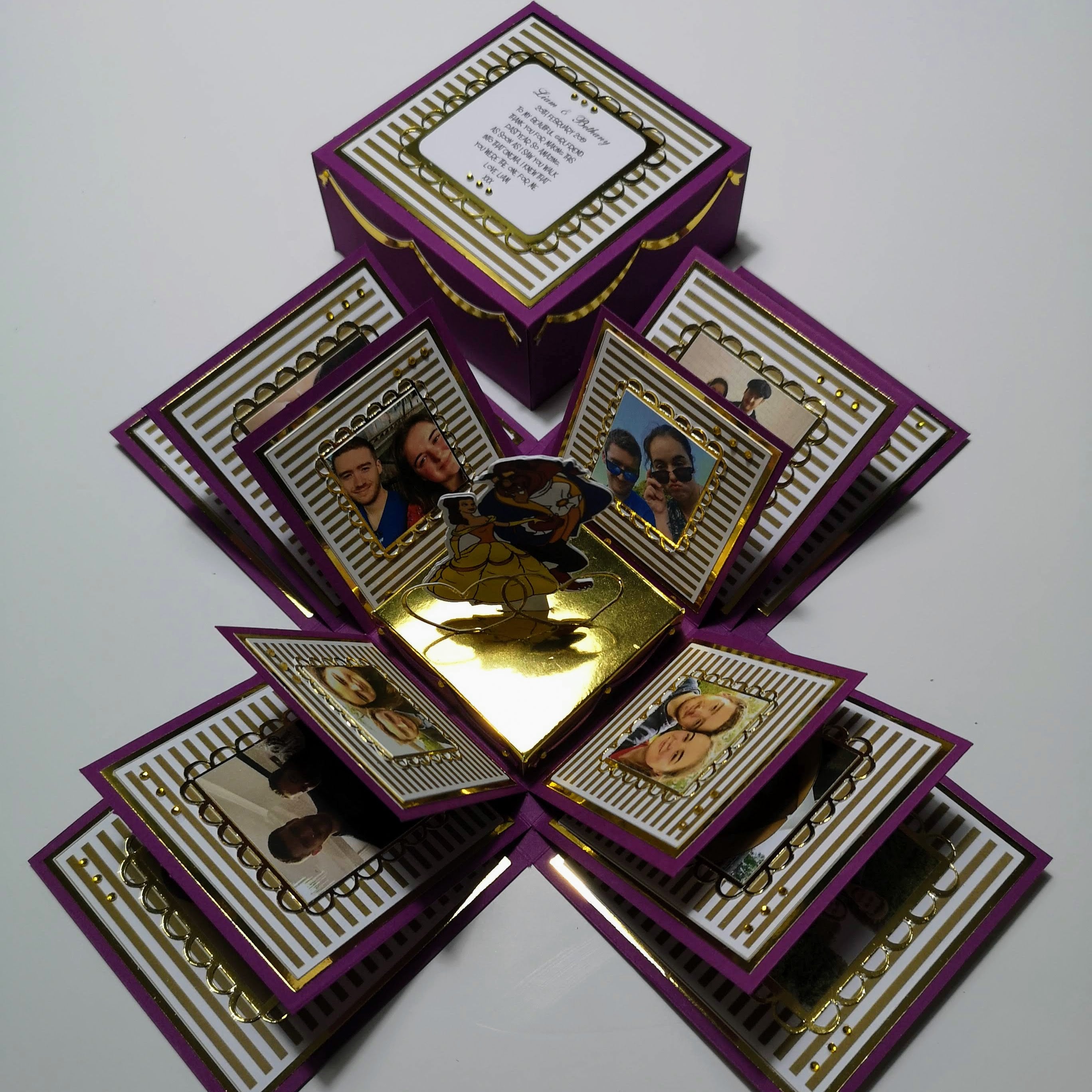 Exploding Memory Photo Box - Purple & Gold Stripes: A customizable keepsake with intricate patterns, featuring a dynamic pop-up centerpiece, designed to elegantly display and cherish treasured memories.