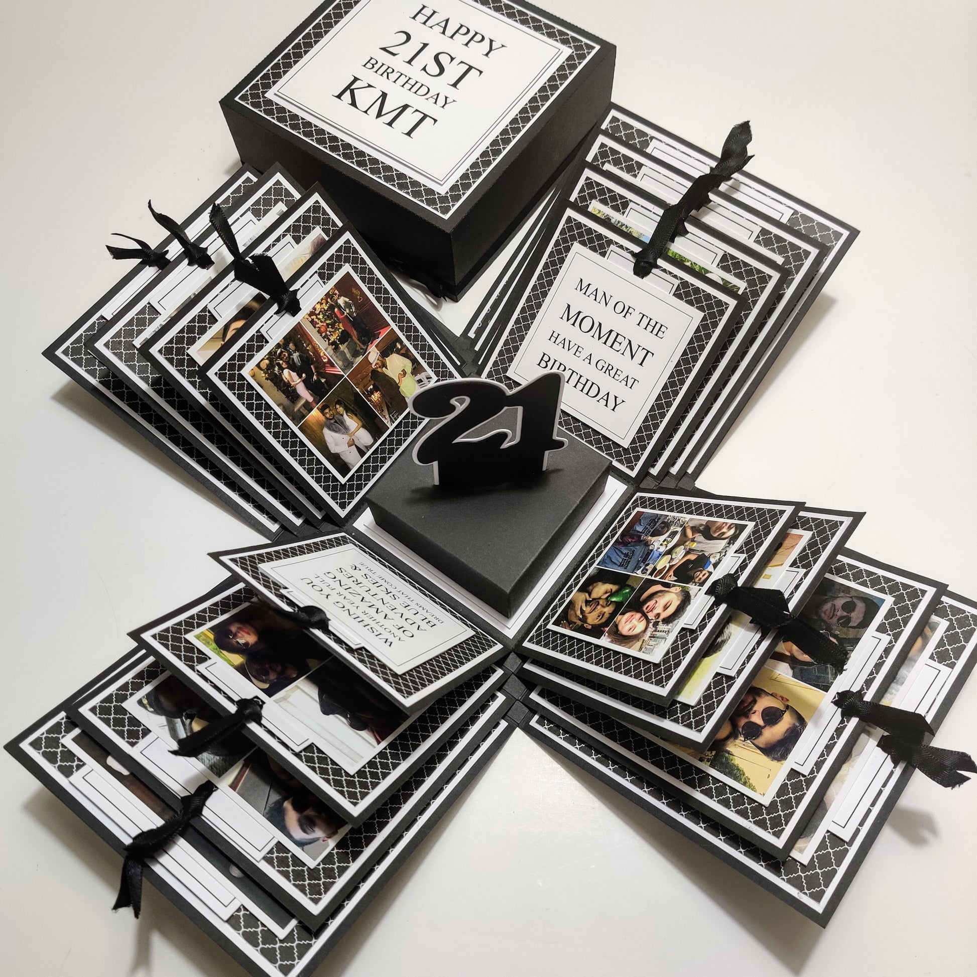 Exploding Memory Photo Box - Surprise Gift - Keepsake Album Box - Christmas Box - Exploding Box (Copy) featuring a black-and-white geometric design, layered compartments, and ribbon-secured photo slots for elegant photo display.