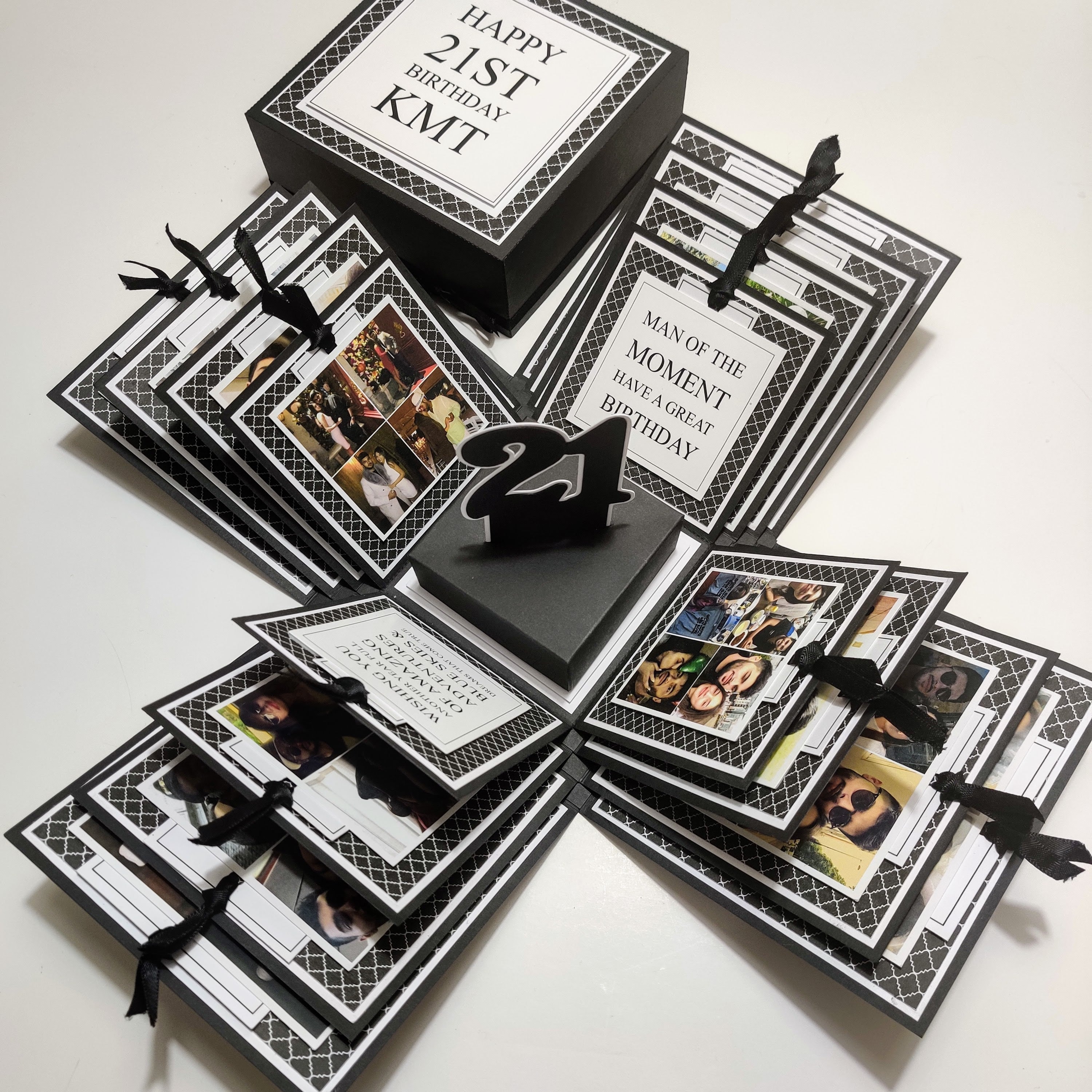 Exploding Memory Photo Box - Surprise Gift - Keepsake Album Box - Christmas Box - Exploding Box (Copy) featuring a black-and-white geometric design, layered compartments, and ribbon-secured photo slots for elegant photo display.