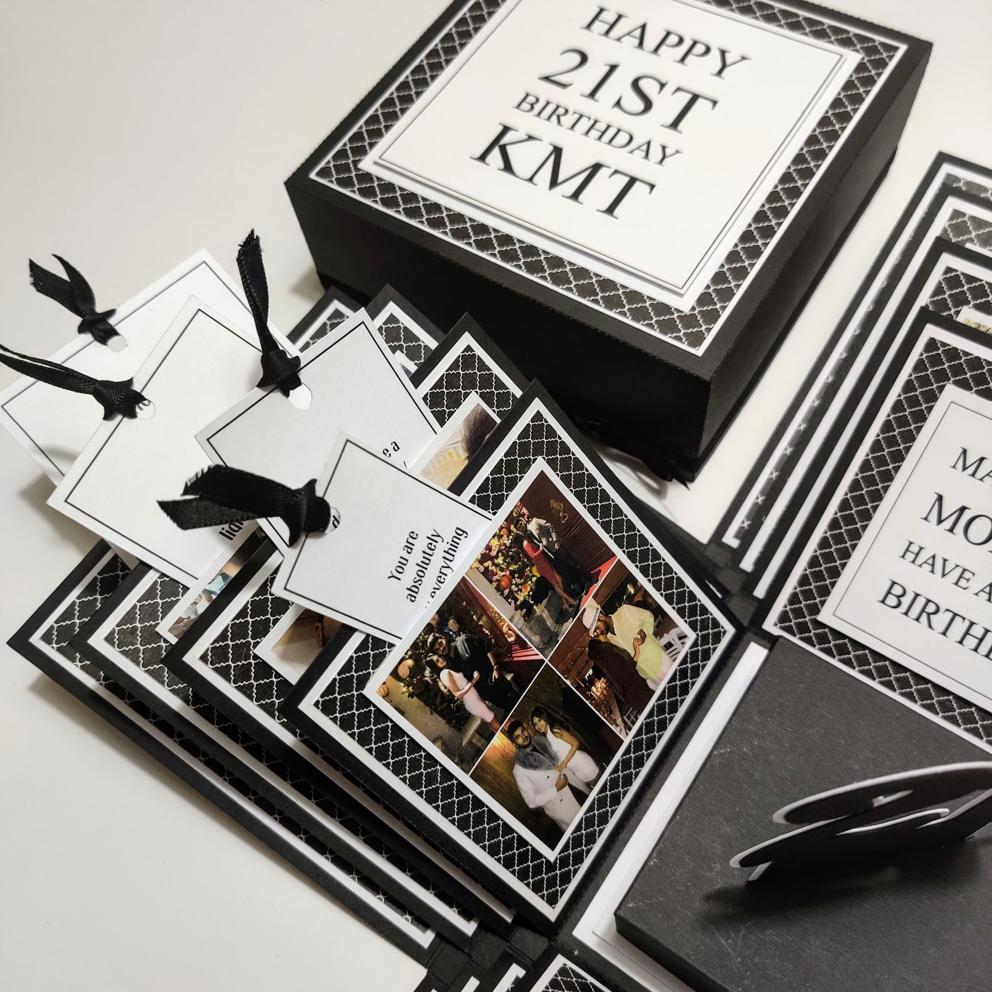 Exploding Memory Photo Box - Surprise Gift - Keepsake Album Box - Christmas Box - Exploding Box. A retro-themed, geometric-patterned, interactive display box with compartments and ribbon-secured slots for organizing photos and mementos.