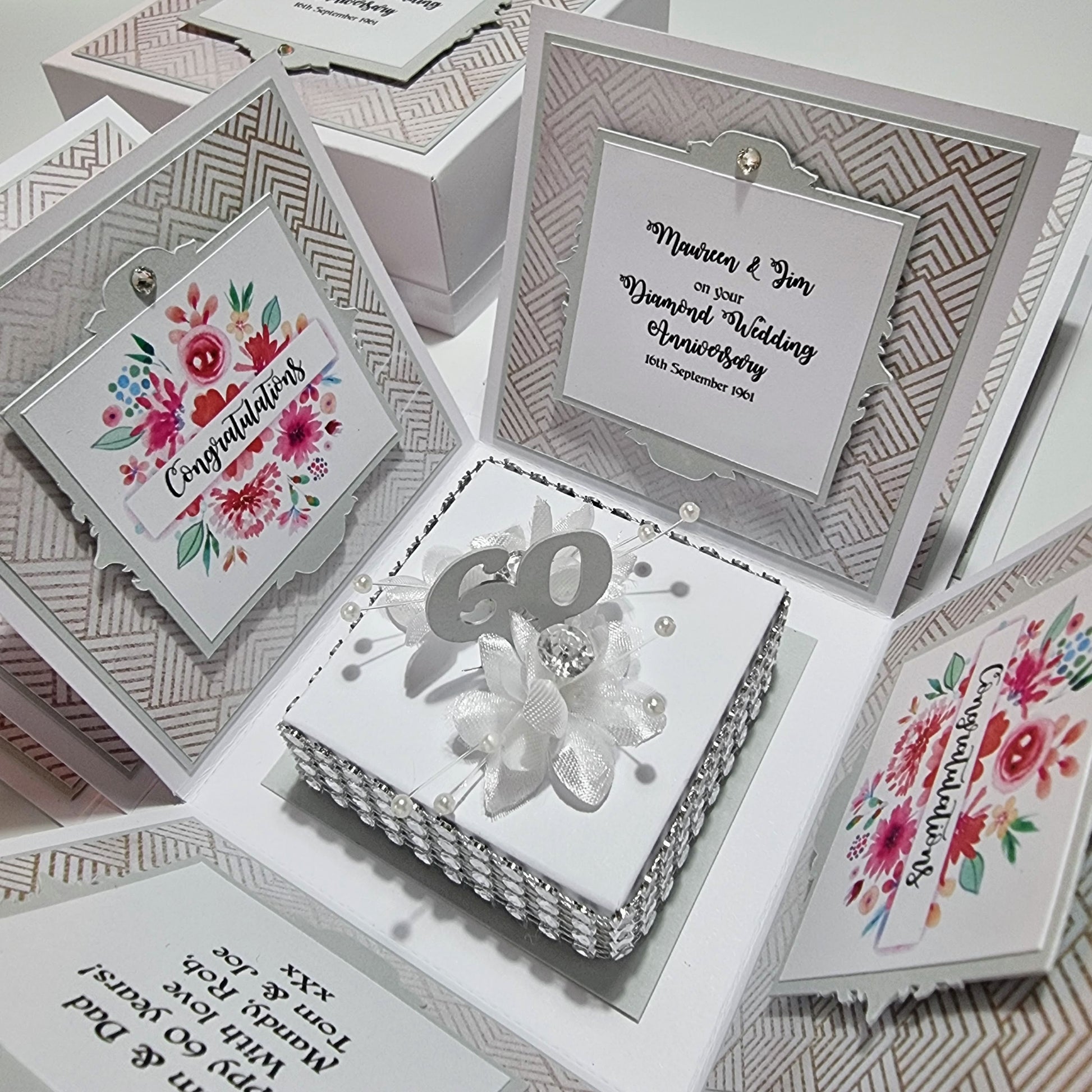 Diamond Wedding Anniversary Exploding Box with elegant diamond-inspired accents, revealing layers of surprises and messages. Features a white base, pearlescent mounts, and customizable options for a personalized tribute.