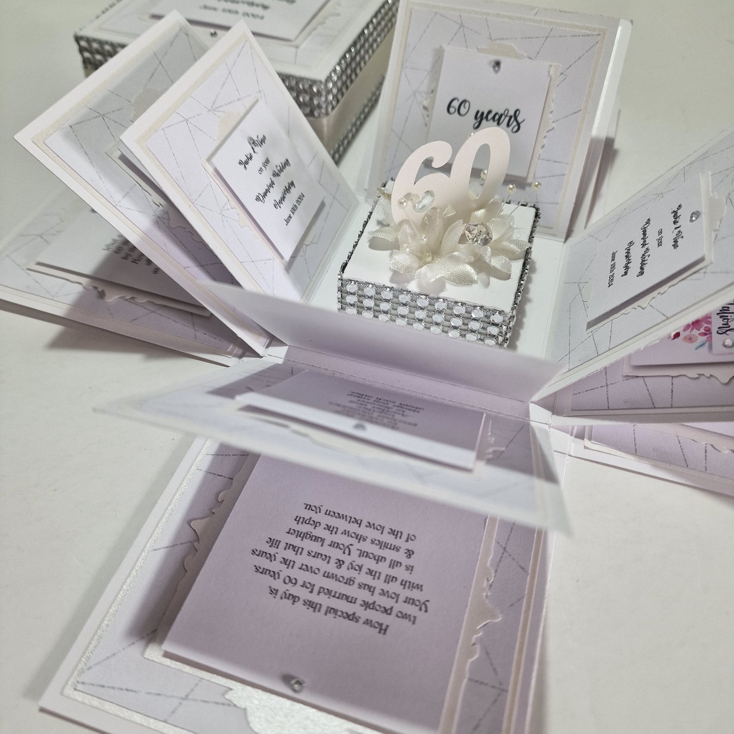 Diamond Wedding Anniversary Exploding Box featuring elegant diamond-inspired design, with white cardstock panels, revealing personalized messages when opened, perfect for commemorating 60 years of love.