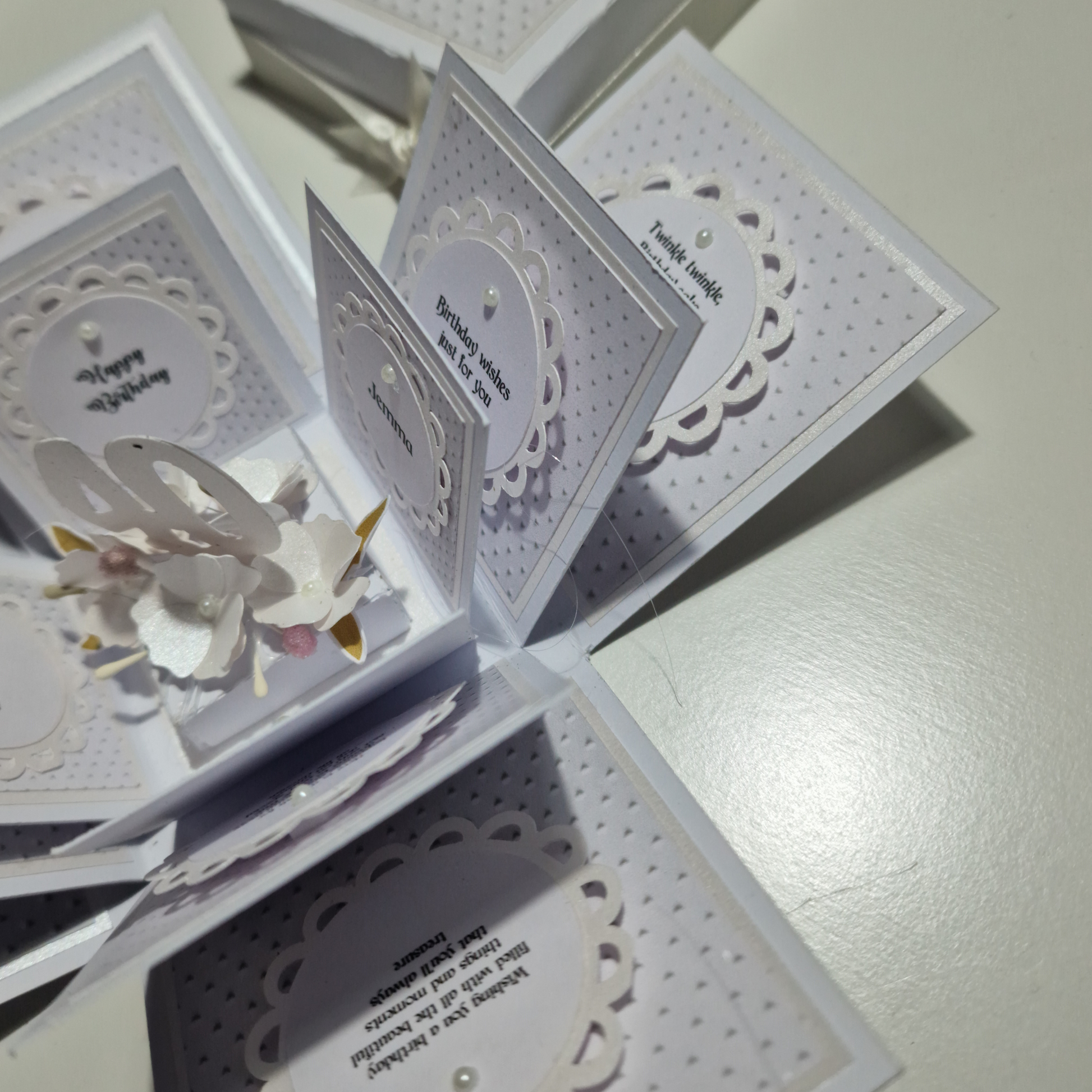Embossed Elegance Birthday Celebration Pop-Open Box Card features intricate embossing on its surface, revealing a festive, celebratory design when opened, ideal for adding a unique touch to birthday greetings.