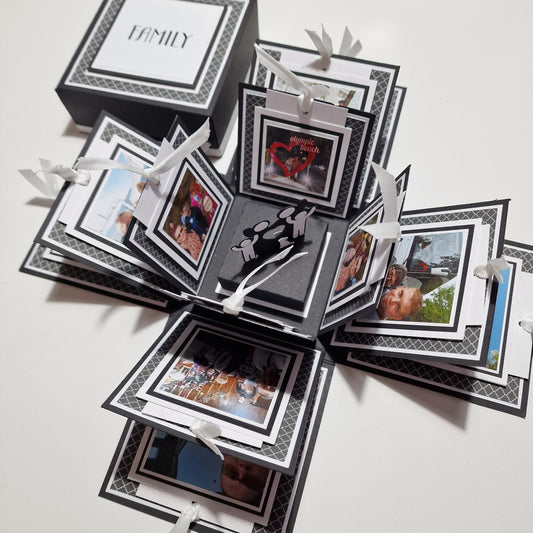 Exploding Memory Photo Box - Surprise Gift - Keepsake Album Box features an intricately designed, multi-layered box with interactive elements like flip albums and fold-out flaps, ideal for storing precious memories.