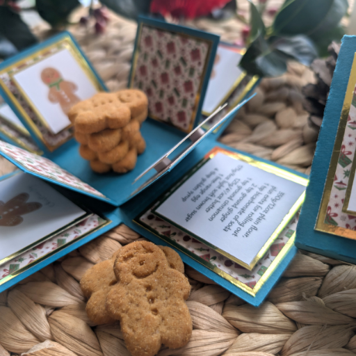 Exploding Christmas Box Card with Gingerbread Recipe – Handmade Festive Keepsake features gingerbread men decor and a real cookie stack, crafted with love, offering a unique holiday gift idea.