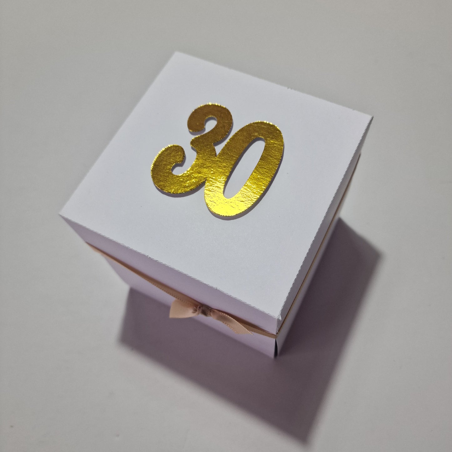 White BOx with 30 on the lid