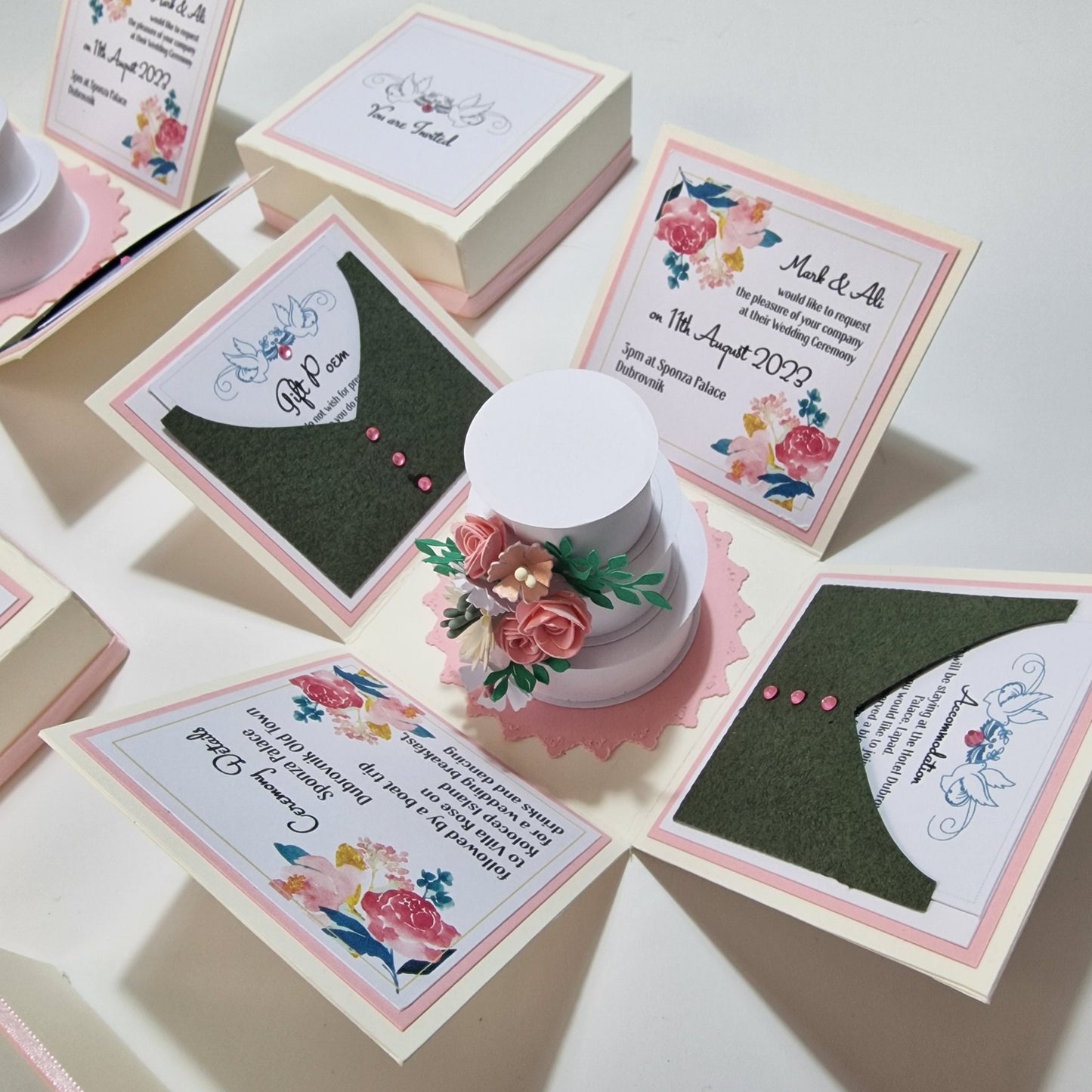 Bohemian Styled Exploding Wedding Invitations do contain a few of the design elements from the Hearts &amp; Doves range however the biggest difference is laid back styling with Central Circular three-tier Wedding cake. The Box is finished off in pastel colours to add a more relaxed feeling.