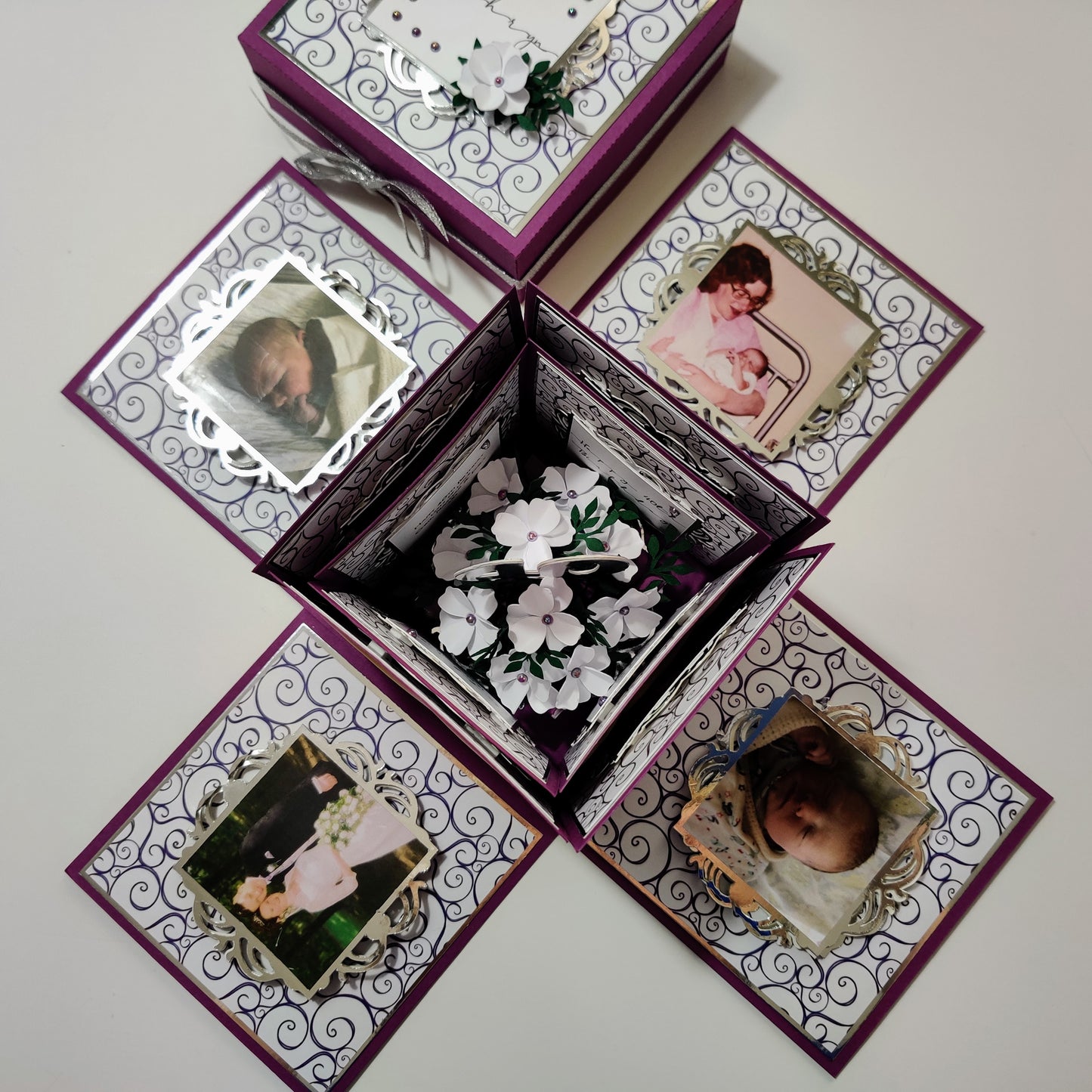Exploding Memory Photo Box - Purple with Silver Swirls; customizable, holds up to 80 photos, available in various sizes. Personalize with chosen design, center feature options include a gift box or photo cube.