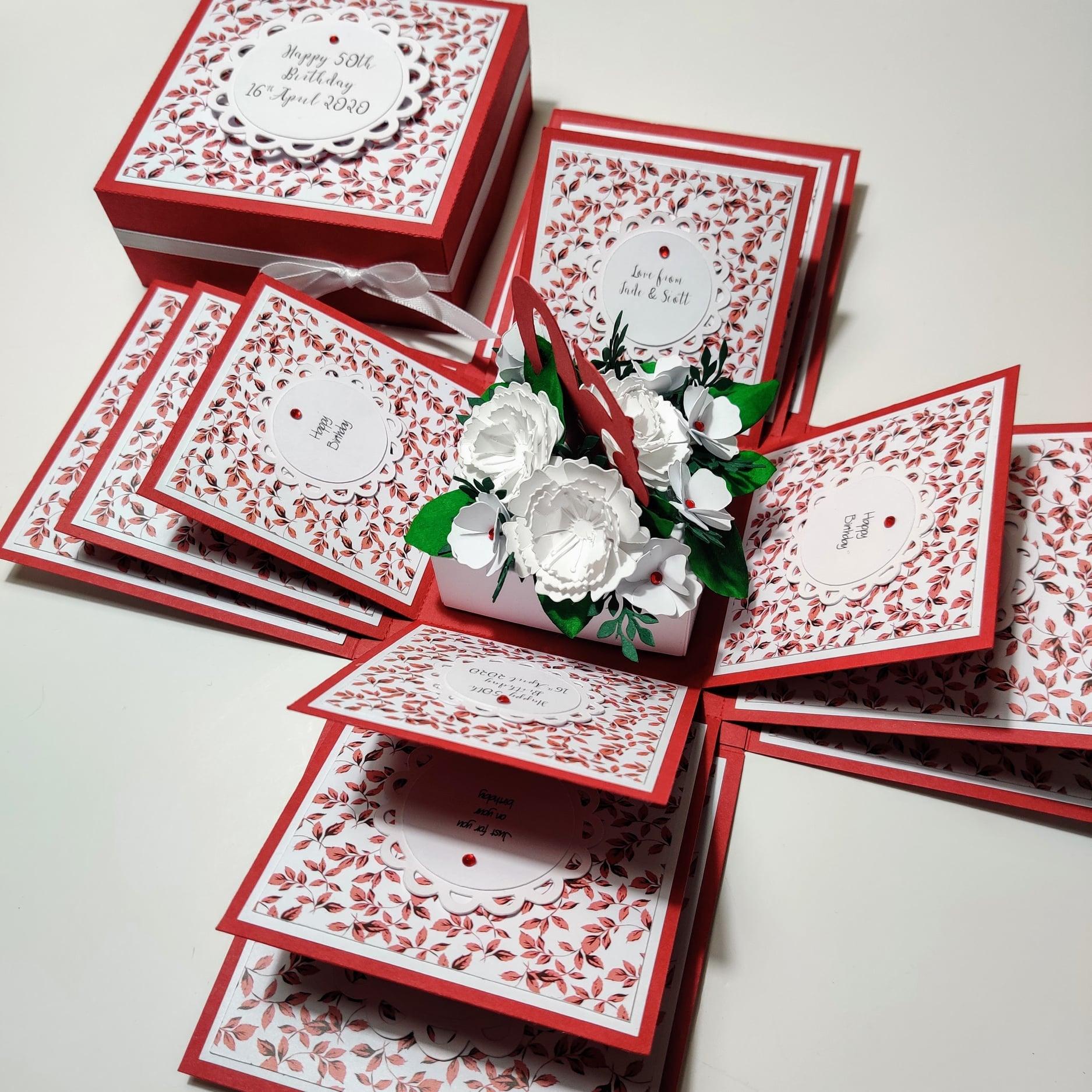 50th Birthday Celebration Occasion Box Red Willow Leaves featuring a red and white floral design, adorned with flowers and foliage, and includes heartfelt birthday messages and a 50th center element.