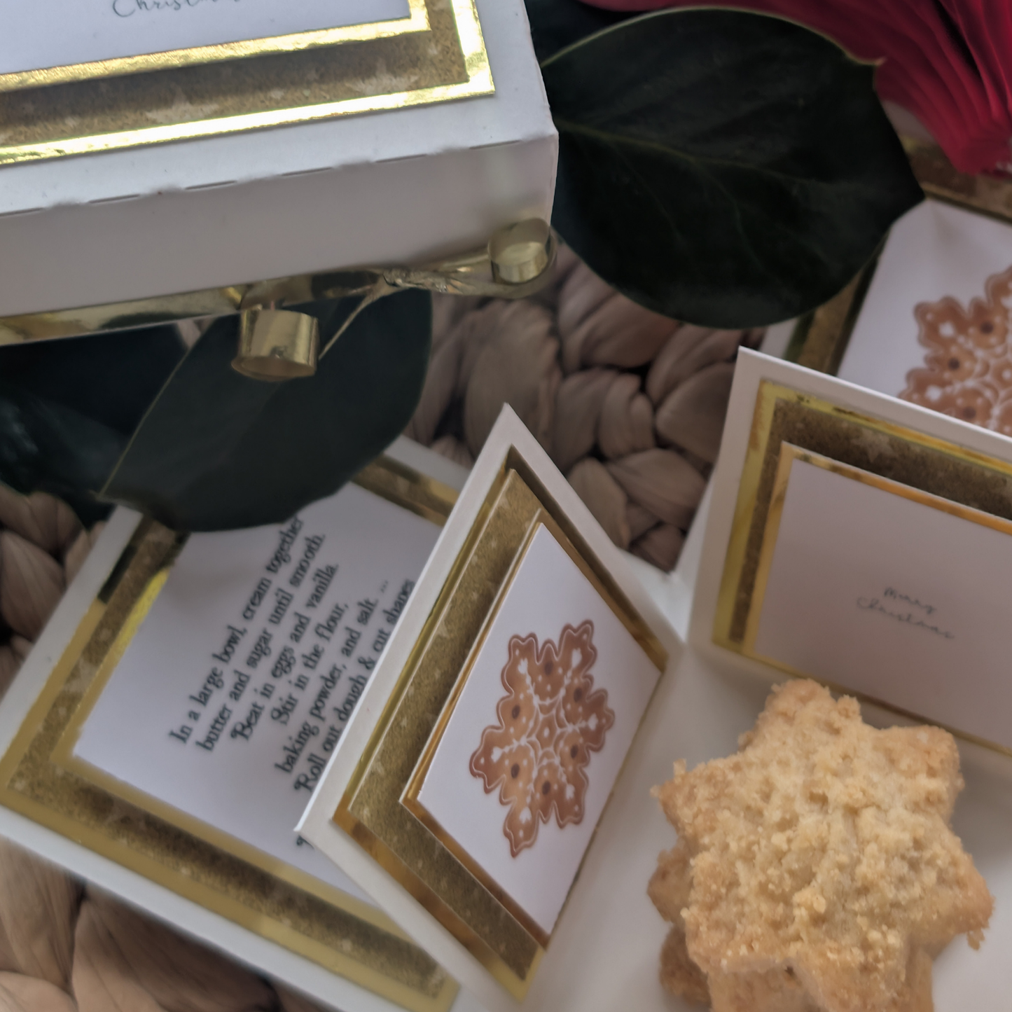 Exploding Christmas Box Card with Shortbread Recipe – Handmade Festive Keepsake, featuring fold-out recipe cards, star-shaped cookies, a Merry Christmas note, and festive foliage for a delightful holiday surprise.