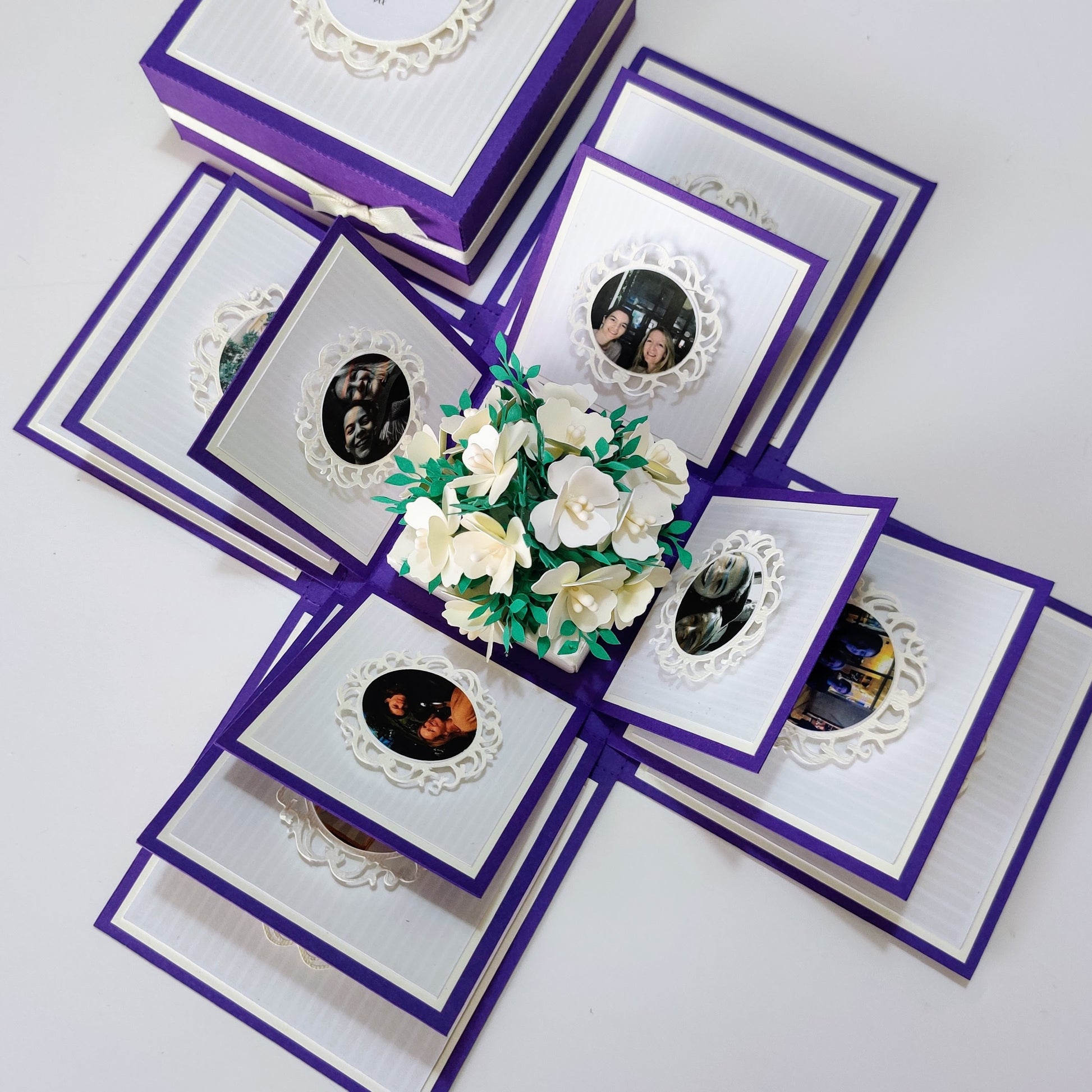 Mother's Day Forever Flower Bouquet Explosion Gift features a box with paper flowers and heartfelt messages, adorned with grey and silver patterns. Includes personalized photo or message options.