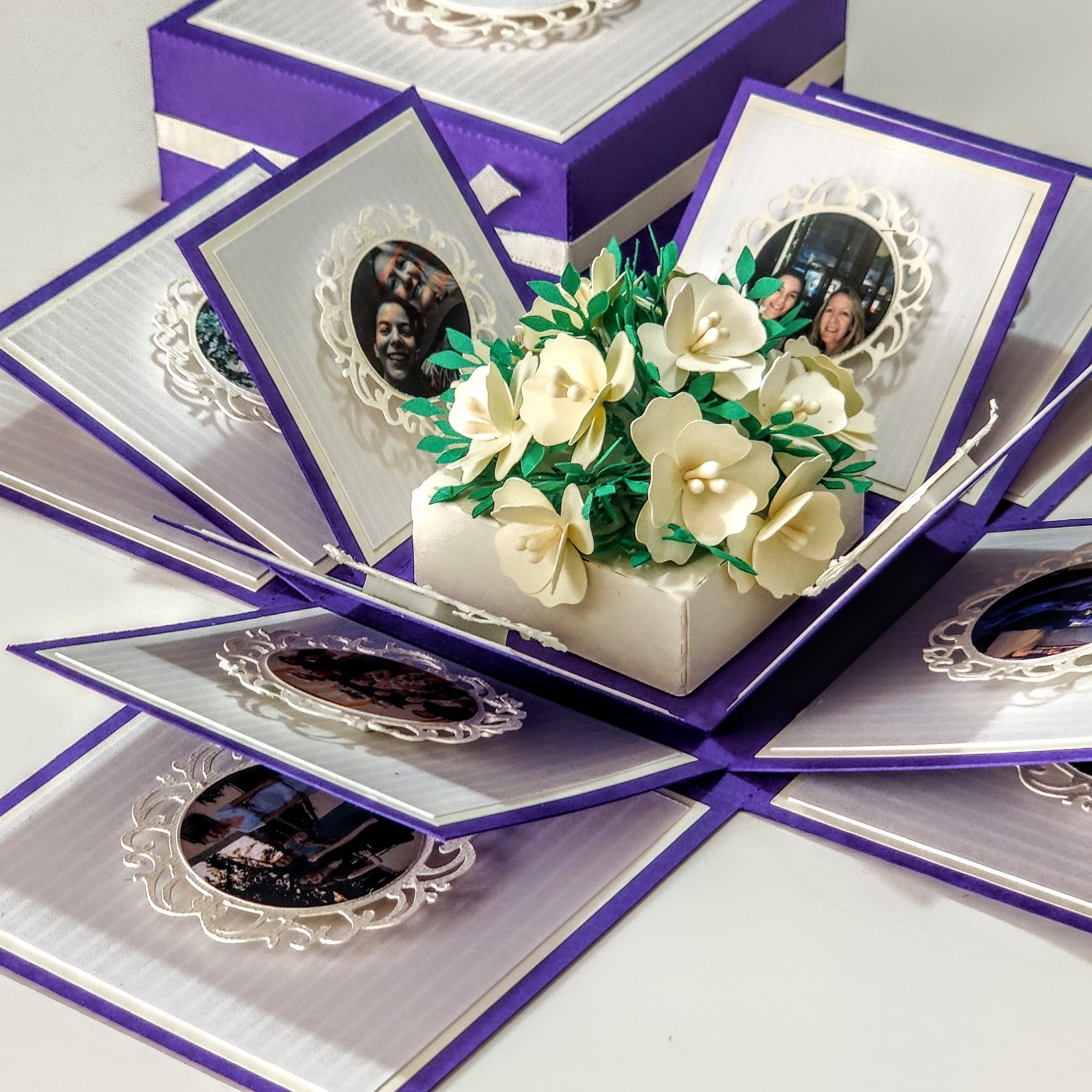 Mother's Day Forever Flower Bouquet Explosion Gift showcases a pop-open card with paper flowers in a box, featuring grey and silver patterns, perfect for celebrating and cherishing heartfelt moments.