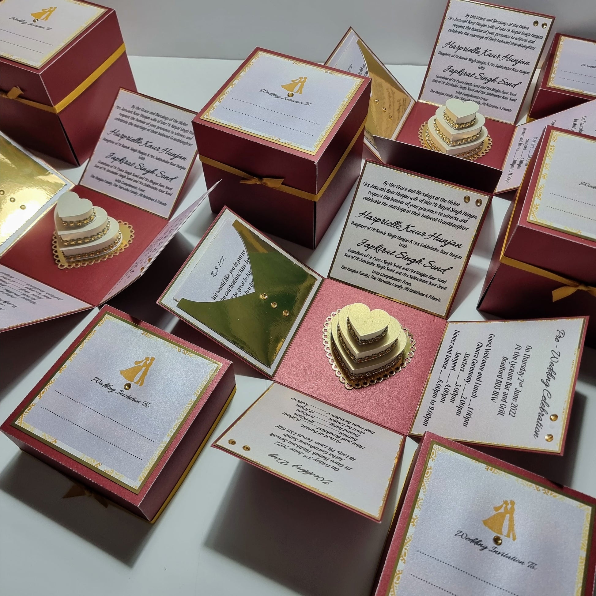 Custom Built Exploding Box Wedding Invitations. Bespoke personalised wedding invites in Red & Gold