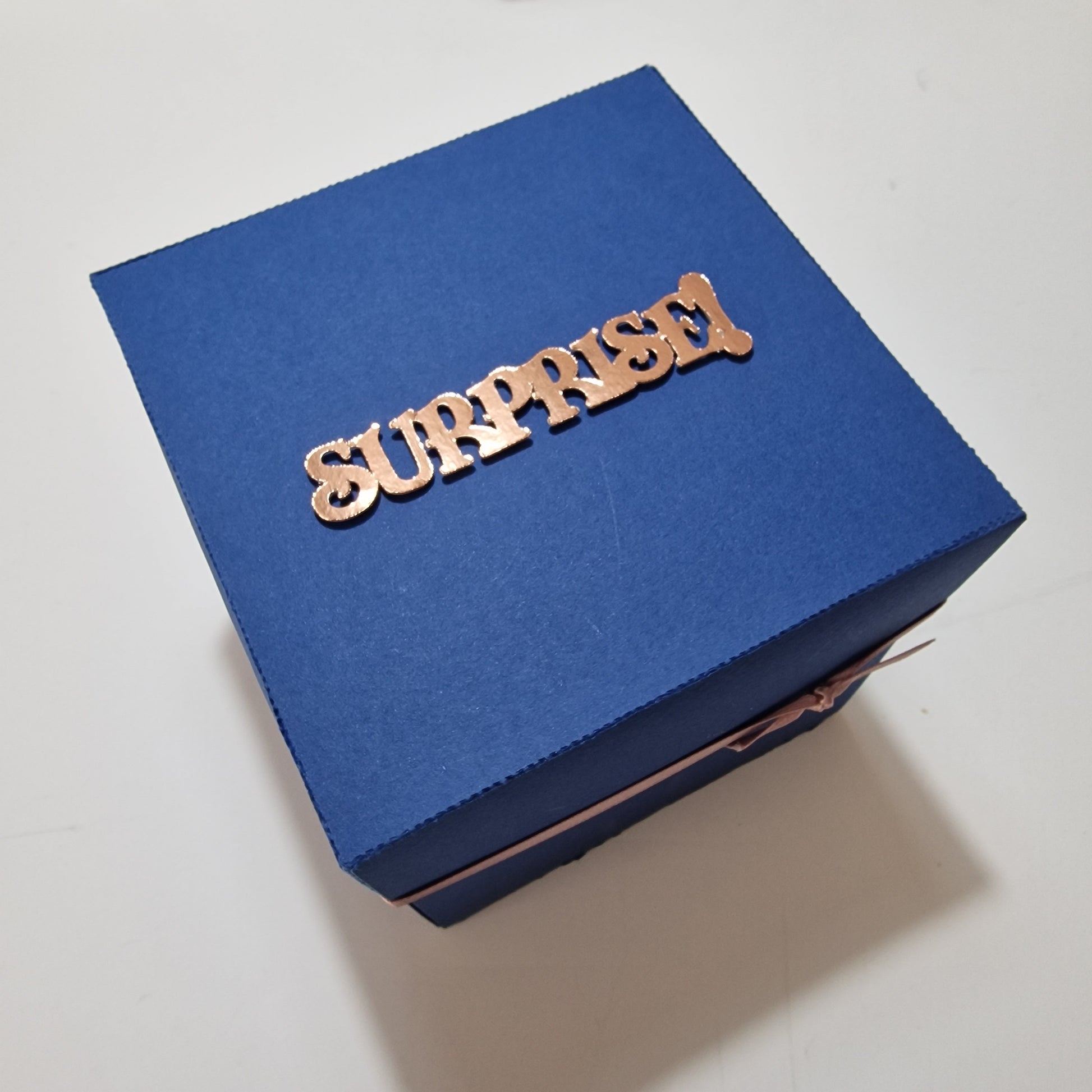 SURPRISE Navy Blue Exploding Thailand Trip Reveal Box with Rose Gold Accents. Contains all the relevant trip information